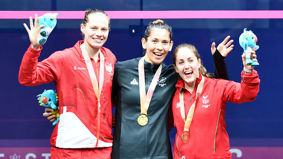 Wales' Tesni Evans, New Zealand's Joelle King and England's Sarah-Jane Perry on the podium at the Gold Coast 2018 Games.